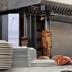 Al Qimma Halal Grill & Butchery - Fresh delicious shawarma meats waiting to be carved.