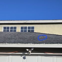 West Coast Precision Roofing - Missing shingles blown off by the rain storms. Possible slow leak over the garage.