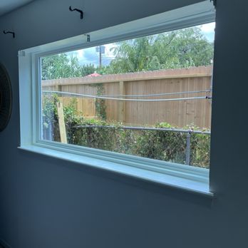 Glasstronics - An inside look of the new window showing the slight tinting that is crystal clear - Windows Installation Near Me - Conroe, Texas