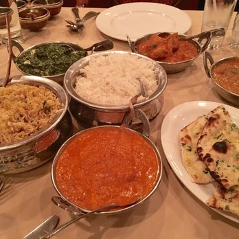 Taj Mahal - Come with more people, try various dishes! Saag paneer, chicken vindaloo, fish curry, garlic naan, chicken tikka masala, and chicken biryani - Indian Near Me - Louisville, Colorado