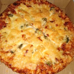 Small pizza. Chicken, pineapple and broccoli. $12.75. All the toppings are under the cheese!