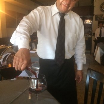 Da Salvatore - Miguel pours the wine - Italian Near Me - Tijuana, BCN Da Salvatore - Miguel pours the wine - Italian Near Me - Tijuana, BCN