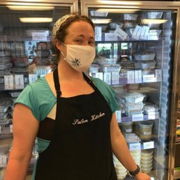 a woman wearing a face mask a woman wearing a face mask