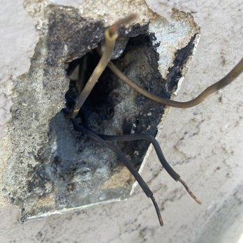 Johns Electric - Before he came to fix/ replace my outlet - Electricians Near Me