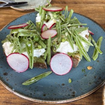 Metropolis - Burrata & Sugar Snap Pea Bruschetta - New American Near Me - Boston, Massachusetts