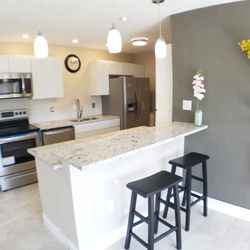 Unique Kitchen & Bath - An example of a Unique Kitchen kitchen.
