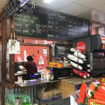 Nely's Taqueria - a man behind the counter - Mexican Near Me - Aledo, Texas Nely's Taqueria - a man behind the counter - Mexican Near Me - Aledo, Texas