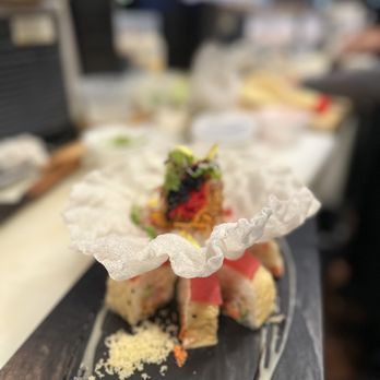 Megumi - a plate of food on a table - Japanese Near Me - Mandeville, Louisiana Megumi - a plate of food on a table - Japanese Near Me - Mandeville, Louisiana