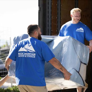 Rocky Mountain Movers - Movers in Salt Lake City Utah moving wrapped furniture into moving truck - Movers Near Me - Murray, Utah Rocky Mountain Movers - Movers in Salt Lake City Utah moving wrapped furniture into moving truck - Movers Near Me - Murray, Utah