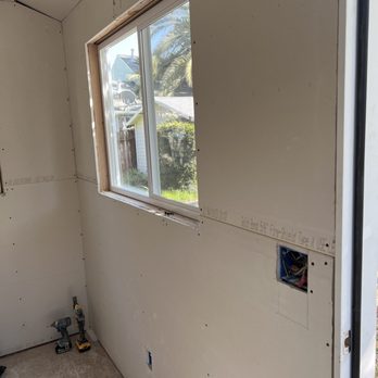 Gogo Gadget Painting - After the insulation and drywall was up - Painters Near Me