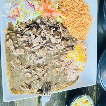 Buffalo Nickel - This is the Carne con Chili, with beans, rice, and a tiny salad. This was absolutely amazing! - Pizza Near Me - Avalon, California Buffalo Nickel - This is the Carne con Chili, with beans, rice, and a tiny salad. This was absolutely amazing! - Pizza Near Me - Avalon, California