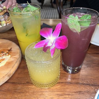 Cafe Sevilla - Mango mojito (left), Chilean Midnight mojito (right), passion fruit caipirinha (bottom) - Spanish Near Me - Costa Mesa, California
