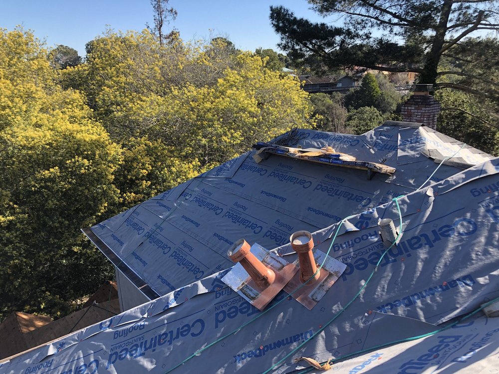 Slide of Modern Roofing