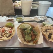Photo of Lucha Libre Gourmet Taco Shop - San Diego, CA, United States. From L to R: grilled shrimp, adobada, and surf and turf