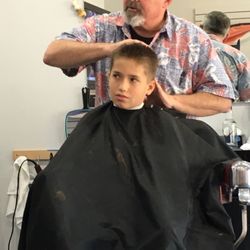 Paul's Barber Shop - Watching College Football!!