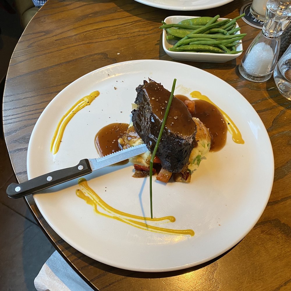 Feather blade cut of beef on mashed potatoes.