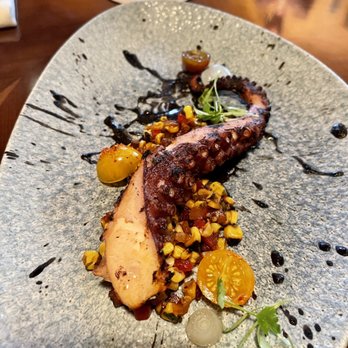 Tiffins Restaurant - Marinated Grilled Octopus - New American Near Me - Lake Buena Vista, Florida Tiffins Restaurant - Marinated Grilled Octopus - New American Near Me - Lake Buena Vista, Florida