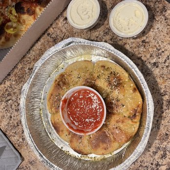 Sexton's Pizza - Knots with marinara. Also featuring a side of their house-made ranch. - Pizza Near Me - Gahanna, Ohio Sexton's Pizza - Knots with marinara. Also featuring a side of their house-made ranch. - Pizza Near Me - Gahanna, Ohio