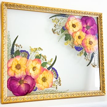 Once Upon A Bouquet - Pressed flower bouquet preserved in a luxury gold frame -- turning blooms into timeless fine art. - Floral Designers Near Me Once Upon A Bouquet - Pressed flower bouquet preserved in a luxury gold frame -- turning blooms into timeless fine art. - Floral Designers Near Me