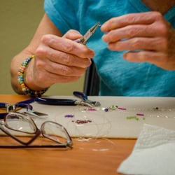Creating wonderful jewelry in our evening beading class.