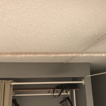 Beach House - Dust on the fan above the bed. I was afraid to even turn it on. - Hotels Near Me - Hilton Head, South Carolina