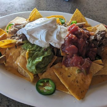 The Lanai at Mamala Bay - Kalua pork nachos $17 - Hawaiian Near Me - Honolulu, Hawaii The Lanai at Mamala Bay - Kalua pork nachos $17 - Hawaiian Near Me - Honolulu, Hawaii