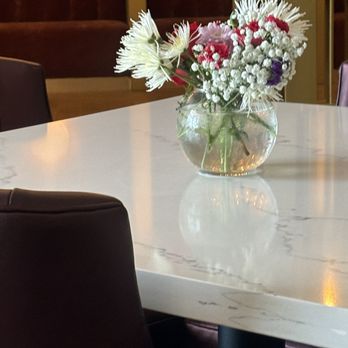 Star Cinema Grill - Fresh flowers on the table - Dinner Theater Near Me - Houston, Texas Star Cinema Grill - Fresh flowers on the table - Dinner Theater Near Me - Houston, Texas