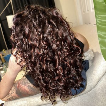 River Salon - Red highlights and gloss with a curly cut by Crystal - Hair Salons Near Me - Brooklyn, New York