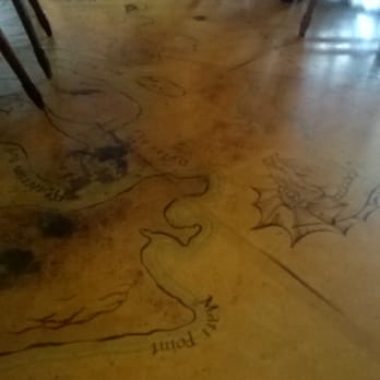 Jolly Roger Taproom - Pirate map painted onto the floor is about as heavy "pirate" themed "The Jolly" is. - Brewpubs Near Me - Seattle, Washington Jolly Roger Taproom - Pirate map painted onto the floor is about as heavy "pirate" themed "The Jolly" is. - Brewpubs Near Me - Seattle, Washington