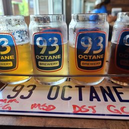 five glasses of beer on a table