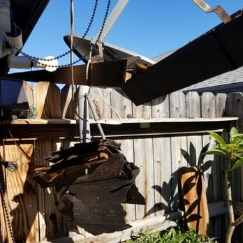 Selah Roofing - Satellite dish just left hanging on our fence. - Roofing Near Me - Commerce, California Selah Roofing - Satellite dish just left hanging on our fence. - Roofing Near Me - Commerce, California
