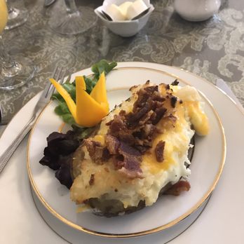 Old Powder House Inn - Twice Baked Breakfast Potato topped with egg and crumbled bacon. - Bed & Breakfast Near Me - Saint Augustine, Florida Old Powder House Inn - Twice Baked Breakfast Potato topped with egg and crumbled bacon. - Bed & Breakfast Near Me - Saint Augustine, Florida
