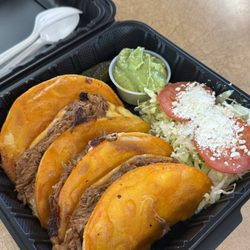 Ruben’s Tacos - Birria tacos plated and ready to eat