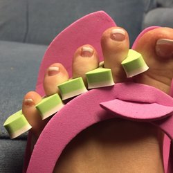 World Nail 2 - My French tips are beautiful and they got them done fast! The pedicure chairs are nice and the service was relaxing!