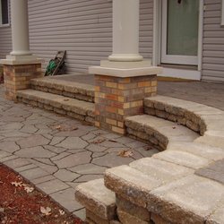 A set of beautiful front entryway steps leading to the front door.