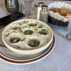 Fireside Dining - Escargot. Homemade croutons in background.