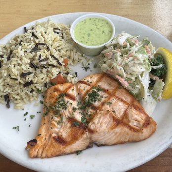 Brophy Bros - Salmon entree with sole slaw and rice pilaf. Creamy green sauce was delicious! - Seafood Near Me - Santa Barbara, California Brophy Bros - Salmon entree with sole slaw and rice pilaf. Creamy green sauce was delicious! - Seafood Near Me - Santa Barbara, California