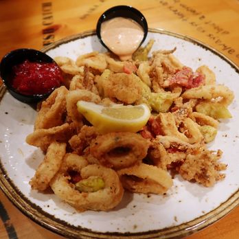 Bubba Gump Shrimp - Calamari: Fried Calamari, Roasted Red Bell Peppers, Pepperoncini, Marinara Sauce, Chili Ancho Aioli - Seafood Near Me - Orlando, Florida