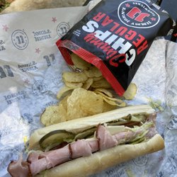 Jimmy John's - $6.36: 6” ham, provolone, mayo, pickles, onion, peppers, Dijon, lettuce, and tomato with a bag of chips - fully customizable.