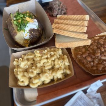 Caldwell County BBQ - Shredded pork baked potato, baked beans, and mac and cheese - Barbeque Near Me - Peoria, Arizona