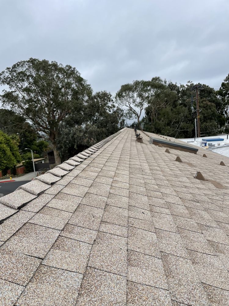 Slide of Galarzas Roofing