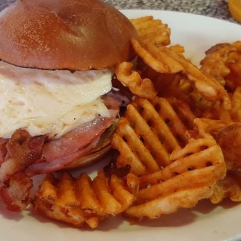 Dixie's Diner - Breakfast burger consist of toasted bun, beef patty, slices of ham and a fried egg. - American Near Me - Idaho Falls, Idaho