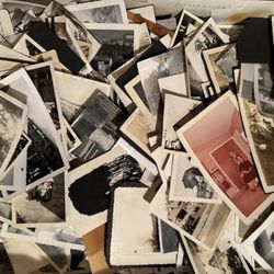 Anastacia's Antiques - A boxed collection of time-worn photographs.
