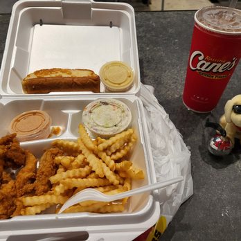 Raising Cane's Chicken Fingers - Chicken strip combo which was delicious with with my miniature dog Cane and my own silver ball. - Fast Food Near Me - Pompano Beach, Florida Raising Cane's Chicken Fingers - Chicken strip combo which was delicious with with my miniature dog Cane and my own silver ball. - Fast Food Near Me - Pompano Beach, Florida