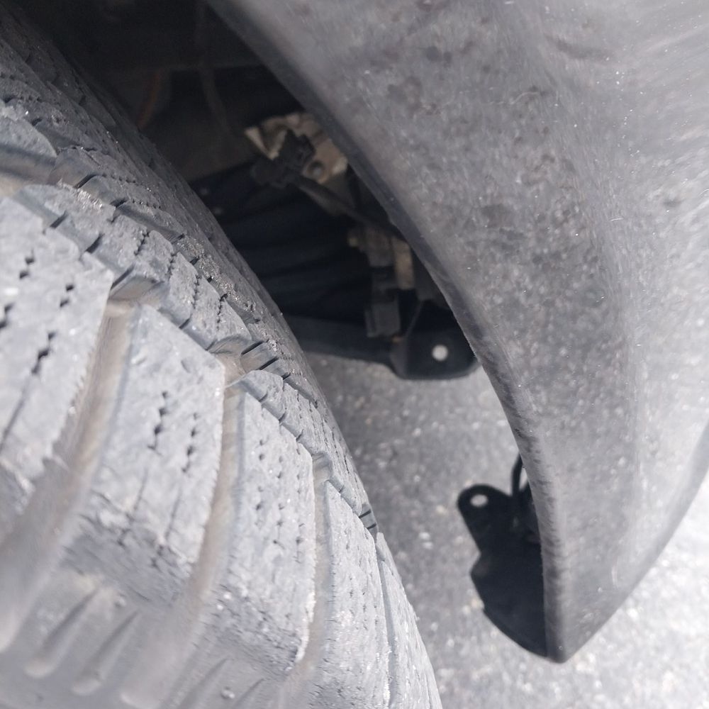 Kalb's Autobody - The front wheel well with no lining after the repair - Body Shops Near Me - Cincinnati, Ohio Kalb's Autobody - The front wheel well with no lining after the repair - Body Shops Near Me - Cincinnati, Ohio