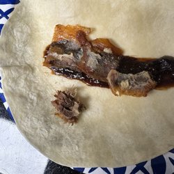 China Palace II - Bones a dry duck on a flour tortilla instead of a rice pancake