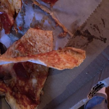 Angelo's Pizza - a half eaten pizza - Pizza Near Me - Auburn, New York Angelo's Pizza - a half eaten pizza - Pizza Near Me - Auburn, New York