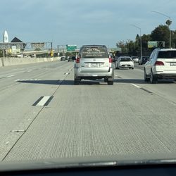 Your female driver is on the fast lane using her cell phone impeding traffic. She was going under 60 mph