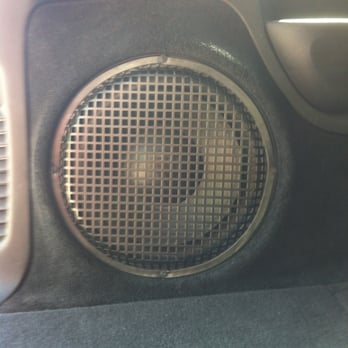North County Mobile Electronics - Closeup of the 12inch sub put into our family SUV where there used to be only an open storage bin.. Completely built out job. - Car Stereo Installation Near Me - Oceanside, California