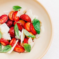The Carleton - Fresh strawberry and tomato salad with shaved parmesan and basil.
